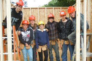 Students of the Skills Link Blossoms Pre-Construction Program, l-r ,Josh Loney, Deanne Jarvis, Katie Hoadley, Katelyn Harpell, Bradley Bain, Devon Loney and Cody Massey